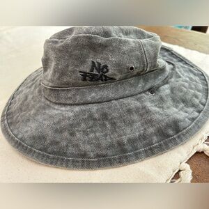 No Fear Sunhat. 3” brim. Vented Hat. Ties around neck w toggle.100 cotton. Gray.